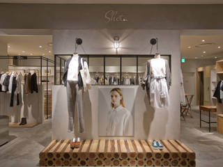 Sheta ルクア1100店, TOOP design works TOOP design works Industrial style houses Concrete