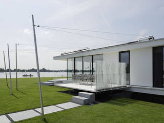 “G-house, villa met gastenverblijf aan de Reeuwijkse Plas” , Lab32 architecten Lab32 architecten Casas de estilo moderno