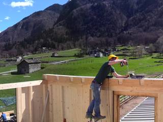 Ampliamento abitazione in Legno, DM HAUS srl DM HAUS srl Rustic style houses