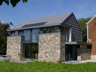 Maison lumineuse et écologique. , ARTERRA ARTERRA Casas de estilo ecléctico Piedra