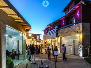 Galeria Comercial en Mina Clavero - Cordoba, AARQUM AARQUM Country style house Stone