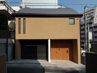 市ヶ谷の家（都市型２世帯住宅・中庭のある外断熱の家）, 中川龍吾建築設計事務所 中川龍吾建築設計事務所 Moderne Häuser Stahlbeton Braun