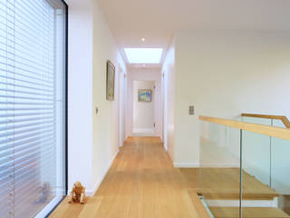 Hall Baufritz (UK) Ltd. Modern corridor, hallway & stairs