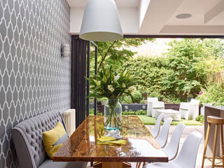 Dining area with garden view Holloways of Ludlow Bespoke Kitchens & Cabinetry Modern kitchen Solid Wood Multicolored Tables & chairs