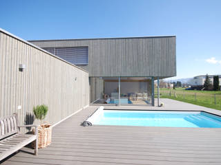 Haus mit Pool statt Garten, schroetter-lenzi Architekten schroetter-lenzi Architekten Moderne Pools