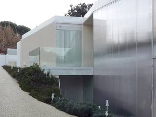 Calçada # house # 1.130, Madrid – Arquitetura Estudio Entresitio, ROC2C_Calçada Portuguesa ROC2C_Calçada Portuguesa Дома в стиле модерн Известняк