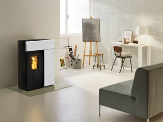 DOMO Pelletofen, RIKA Innovative Ofentechnik GmbH RIKA Innovative Ofentechnik GmbH Livings modernos: Ideas, imágenes y decoración Piedra Chimeneas y accesorios