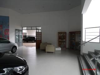 concessionaria VW Taba, Jorge Guizelini Arquitetura Jorge Guizelini Arquitetura مكتب عمل أو دراسة