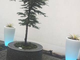 Kiesflächen mit LED Pflanzķübeln, Neues Gartendesign by Wentzel Neues Gartendesign by Wentzel 庭院