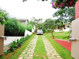 Residência Condomínio Cafezal, Mônica Mellone Arquitetura Mônica Mellone Arquitetura Jardines eclécticos