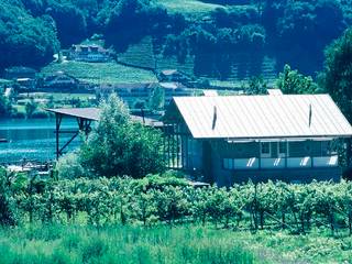 Casa al lago - Caldaro (Bolzano), blueArch blueArch Casas de estilo ecléctico