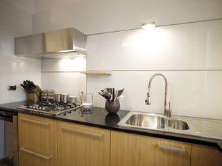 150 sqm Apartment: Essenzialmente rovere, PAZdesign PAZdesign مطبخ ذو قطع مدمجة