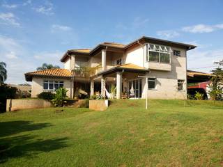 Residência Unifamiliar em Ribeirão Preto, Graziella Corrado Arquitetura Graziella Corrado Arquitetura Casas modernas