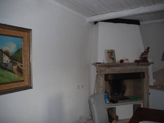 Un rustico a tema ippico, Ghirigori Lab di Arianna Colombo Ghirigori Lab di Arianna Colombo Rustic style living room