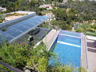 Piscina e tettoia in vetro (Cannes / France), GA-DeSIGN | gep studio di g. venuta & c. s.a.s. GA-DeSIGN | gep studio di g. venuta & c. s.a.s. Modern pool
