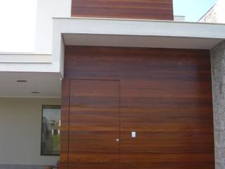 Front (Fachada frontal) homify Casas modernas Piedra