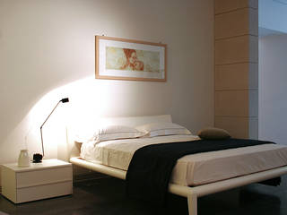 Espressioni artistiche, Arch. Vittoria Ribighini Arch. Vittoria Ribighini Modern style bedroom Beds & headboards