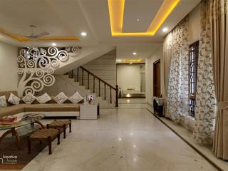 INDEPENDANT HOUSE DESIGNED IN A MINIMALISTIC ORNAMENTAL STYLE,INDEPENDENT HOUSE AT HYDERABAD, KREATIVE HOUSE KREATIVE HOUSE Livings de estilo clásico Tablero DM