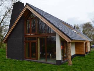Ecologische woning Chaam, STROOM architecten STROOM architecten Country style house Stone Black
