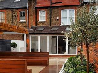 Addition of a Loft Conversion, Rear Extension with bi folding doors and a contemporary garden IS AND REN STUDIOS LTD loft conversion,extension,sash windows,contemporary garden,wooden bench,raised flower bed,raised planting,evergreens,olive trees,red cedar,victorian home