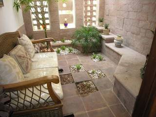 Stone Courtyard House, Ansari Architects Ansari Architects Moderner Garten