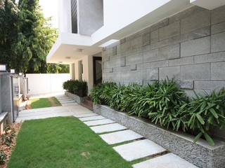 Landscape Ansari Architects Modern garden Plant,Road surface,Tree,Land lot,Grass,Urban design,Flooring,Building,Shrub,Real estate