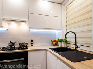 Kuchnia z nowoczesnym oświetleniem, Sebastian Germak - Avangarda Meble Sebastian Germak - Avangarda Meble Modern kitchen Granite