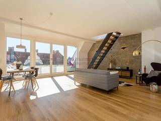 Home Staging einer Dachgeschoss-Wohnung im Loft-Stil, staged homes staged homes غرفة المعيشة