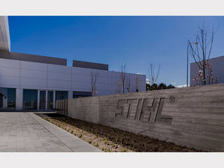 CENTRO DE FORMACIÓN STIHL, Quadro Quadro Jardines modernos Concreto