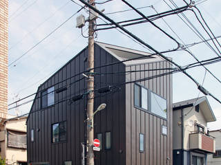 十字路に建つスキップハウス, 設計事務所アーキプレイス 設計事務所アーキプレイス Moderne Häuser