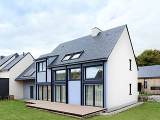 Maison Passive, O2 Concept Architecture O2 Concept Architecture Passive house Metal Blue
