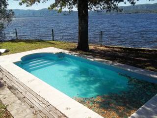 Importante propiedad frente al lago, Liliana almada Propiedades Liliana almada Propiedades Piscinas de estilo clásico