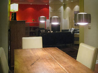Wohnzimmer rote Wand, Mettner Raumdesign Mettner Raumdesign Livings de estilo moderno