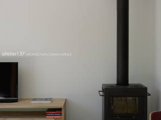 043八ヶ岳原村Tさんの家, atelier137 ARCHITECTURAL DESIGN OFFICE atelier137 ARCHITECTURAL DESIGN OFFICE Skandinavische Wohnzimmer Eisen/Stahl Schwarz
