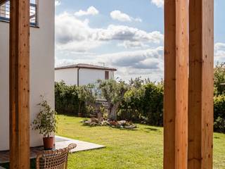 Casa mediterranea ad alta efficienza energetica "A e D", Studio di Architettura Ortu Pillola e Associati Studio di Architettura Ortu Pillola e Associati Giardino in stile mediterraneo Legno