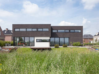 Villa Montfoort, Station-D Architects Station-D Architects Modern Houses Bricks