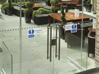 Secure Glass Doors in Commercial Buildings , Ion Glass Ion Glass مساحات تجارية زجاج