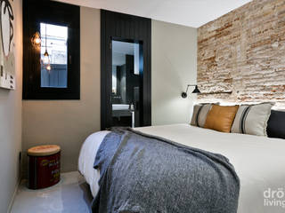 Apartamento en Poblenou: 100% industrial, Dröm Living Dröm Living Camera da letto in stile industriale