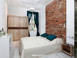 Cegły i piec kaflowy., idea projekt idea projekt Eclectic style bedroom Bricks White