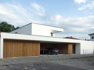 Einfamilienhaus mit Einliegerwohnung, Viktor Filimonow Architekt in München Viktor Filimonow Architekt in München Modern houses Wood Wood effect