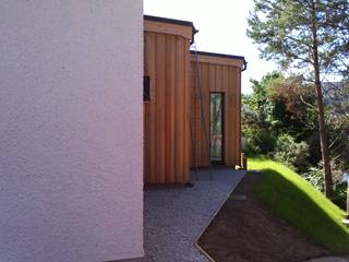 New House in Ullapool, Matheson Mackenzie Ross Architects Matheson Mackenzie Ross Architects Casas modernas Madera maciza Multicolor