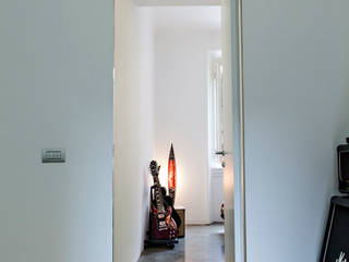 Rifugio urbano, studio ferlazzo natoli studio ferlazzo natoli Minimalistyczna sypialnia