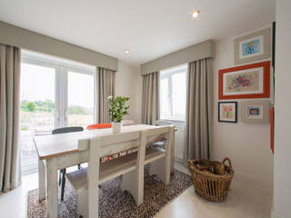 Open plan living and dining room in grayscale, Design by Jo Bee Design by Jo Bee Dining room