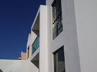 AD.GOGUE, Base cubica Arquitectos Base cubica Arquitectos Moderne huizen