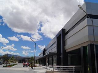 Outlet San Martin, Studio Glass Studio Glass Modern Houses Aluminium/Zinc