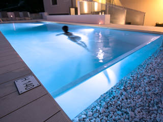 Hotel Nettuno | Outdoor spaces and infinity pool, DomECO DomECO Modern pool