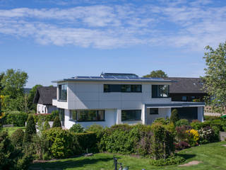 Vom Luxus des Einfachen, KitzlingerHaus GmbH & Co. KG KitzlingerHaus GmbH & Co. KG Einfamilienhaus Holzwerkstoff Weiß