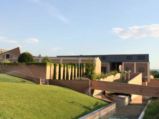 Industrial style houses by Architetto Silvia Giacobazzi Industrial