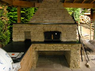 Outdoor kitchen in oak, wood-fired oven wood-fired oven