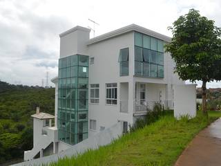 Residência Alphaville, Atelier Plural Atelier Plural Modern houses Glass